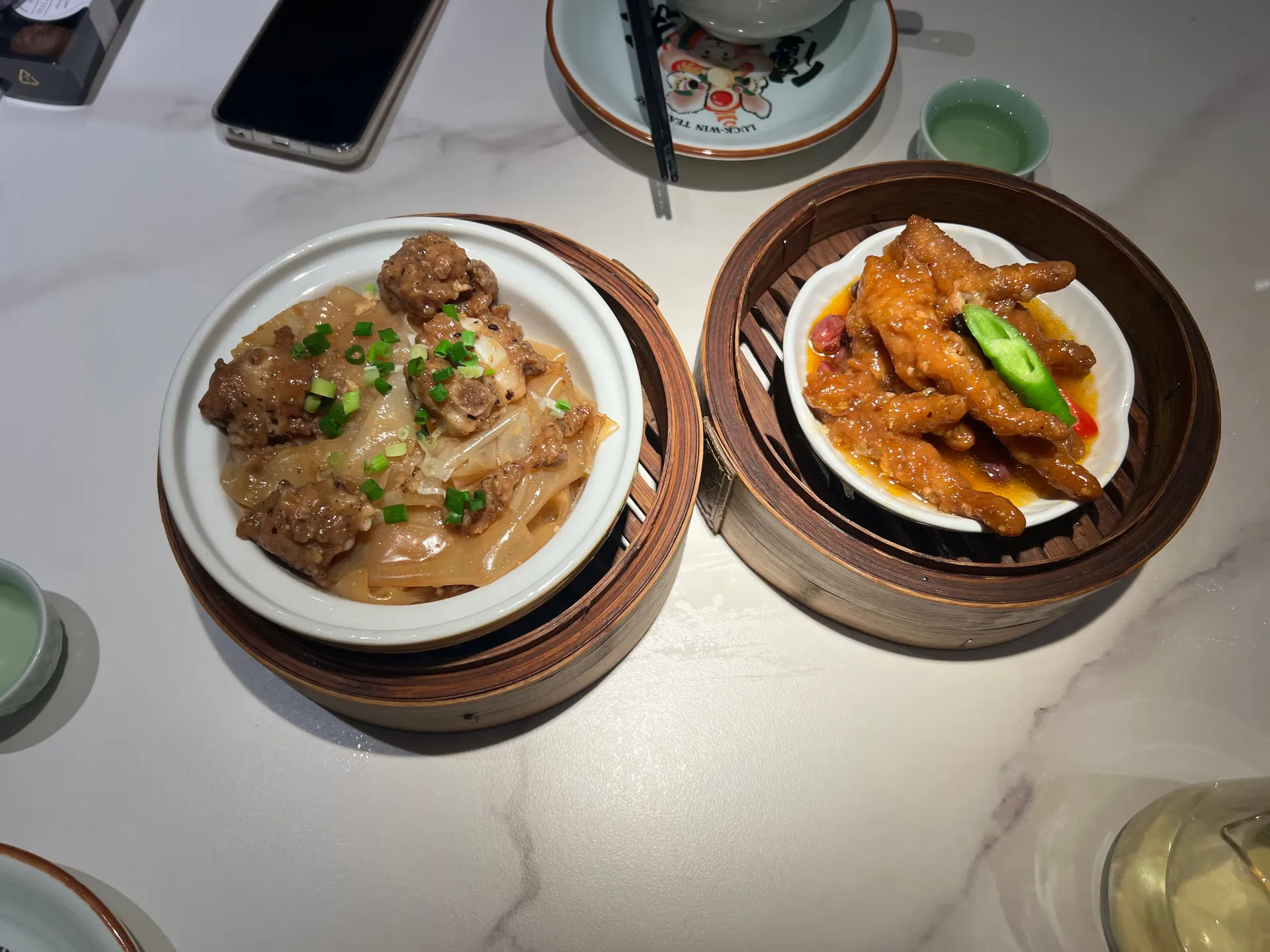 Two dim sum dishes on the table