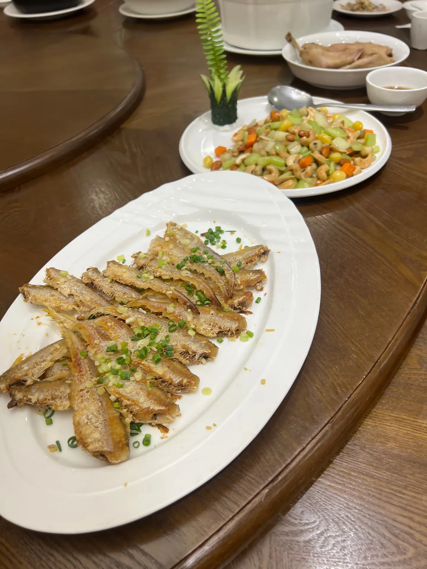 Fried fish and vegetables stir fried with nuts