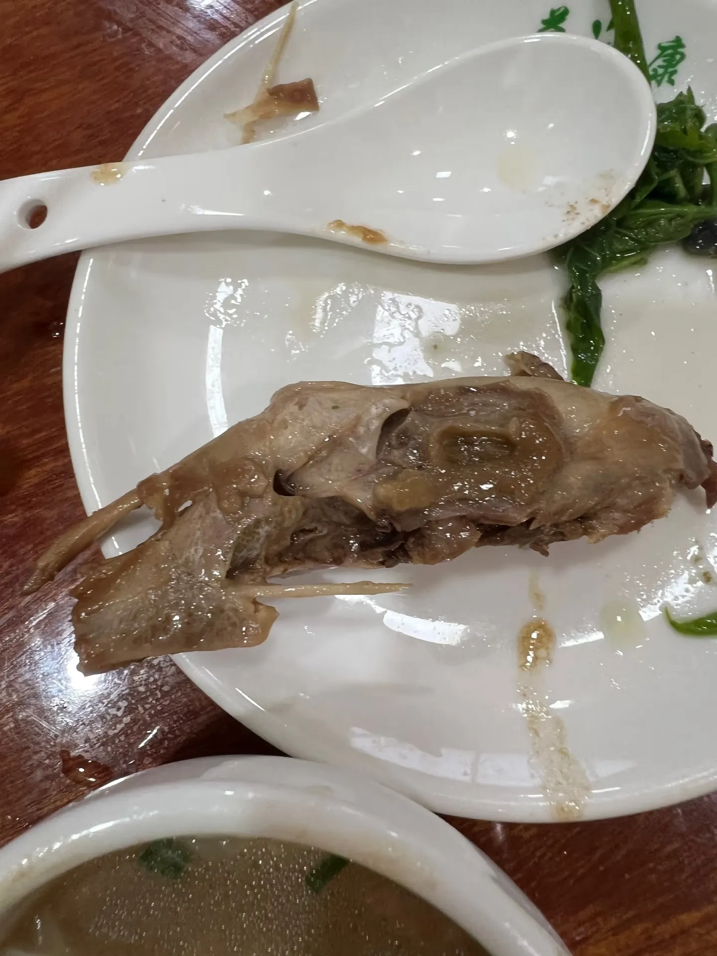A goose head on a plate