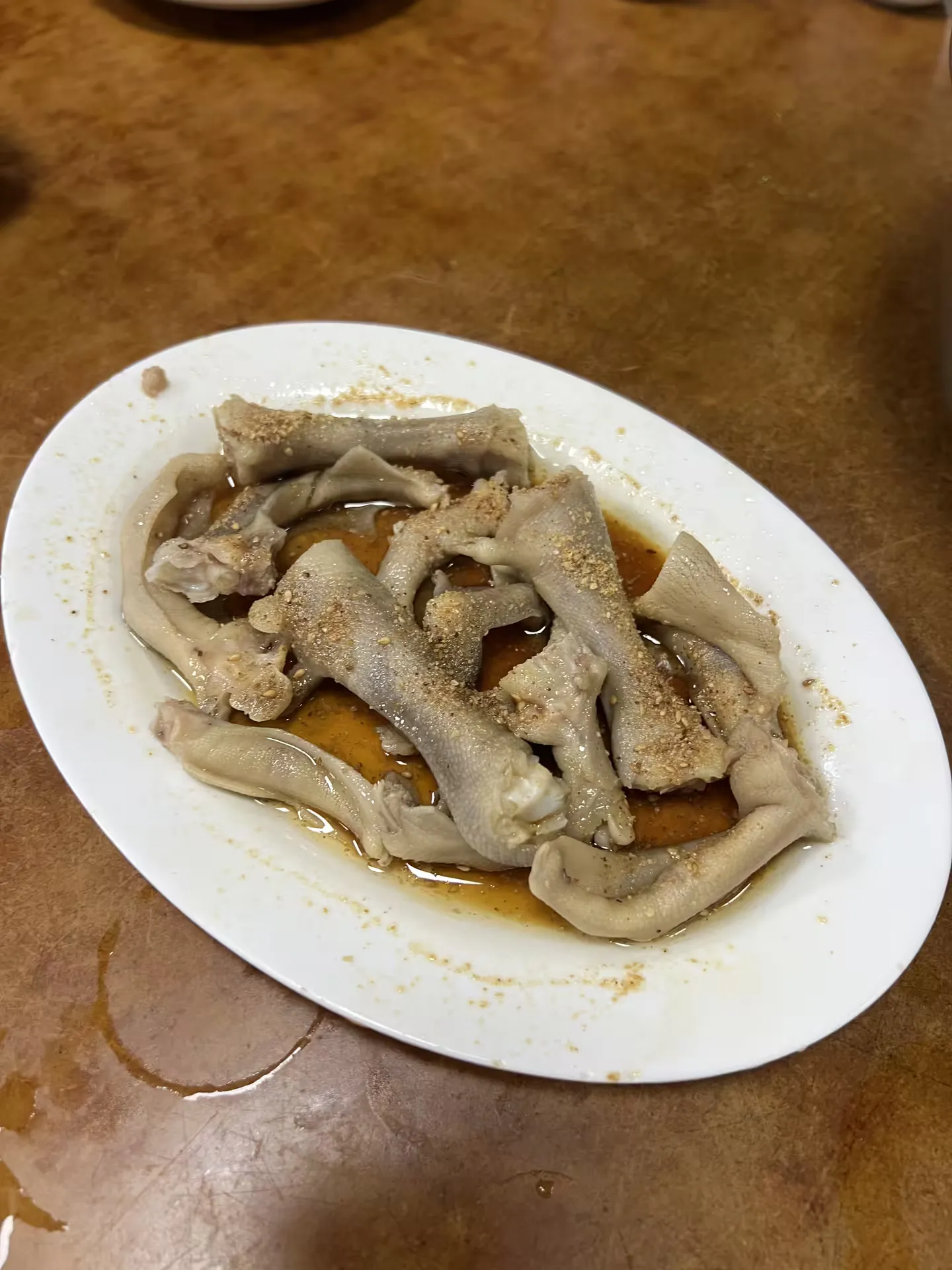 Goose feet with soy sauce and ground peanuts