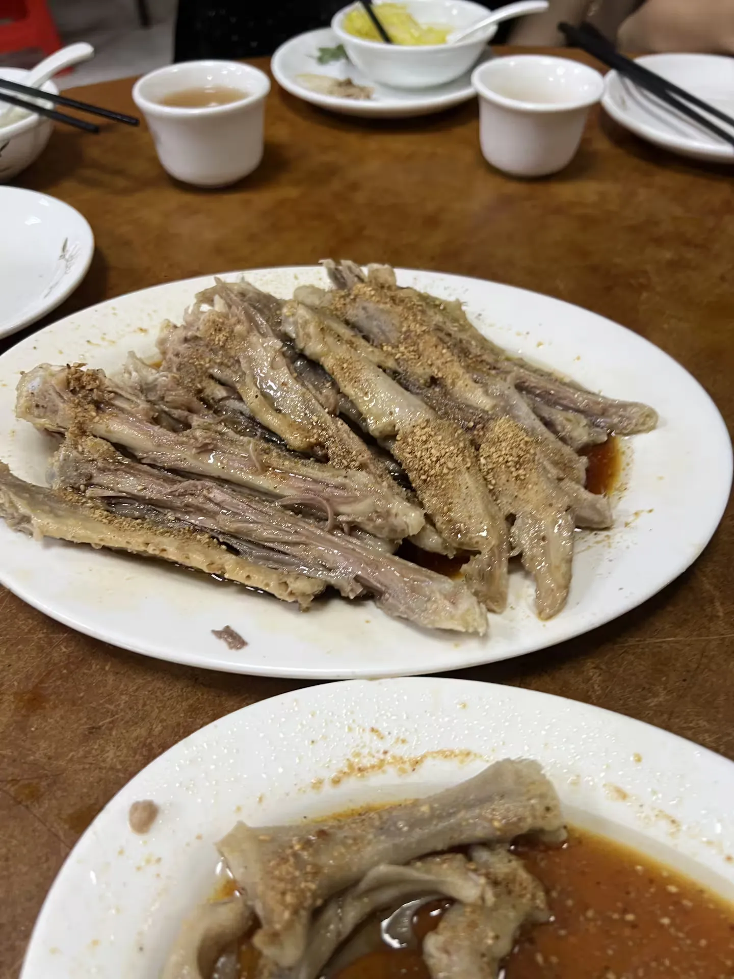 Chewy pieces of goose wing on a plate
