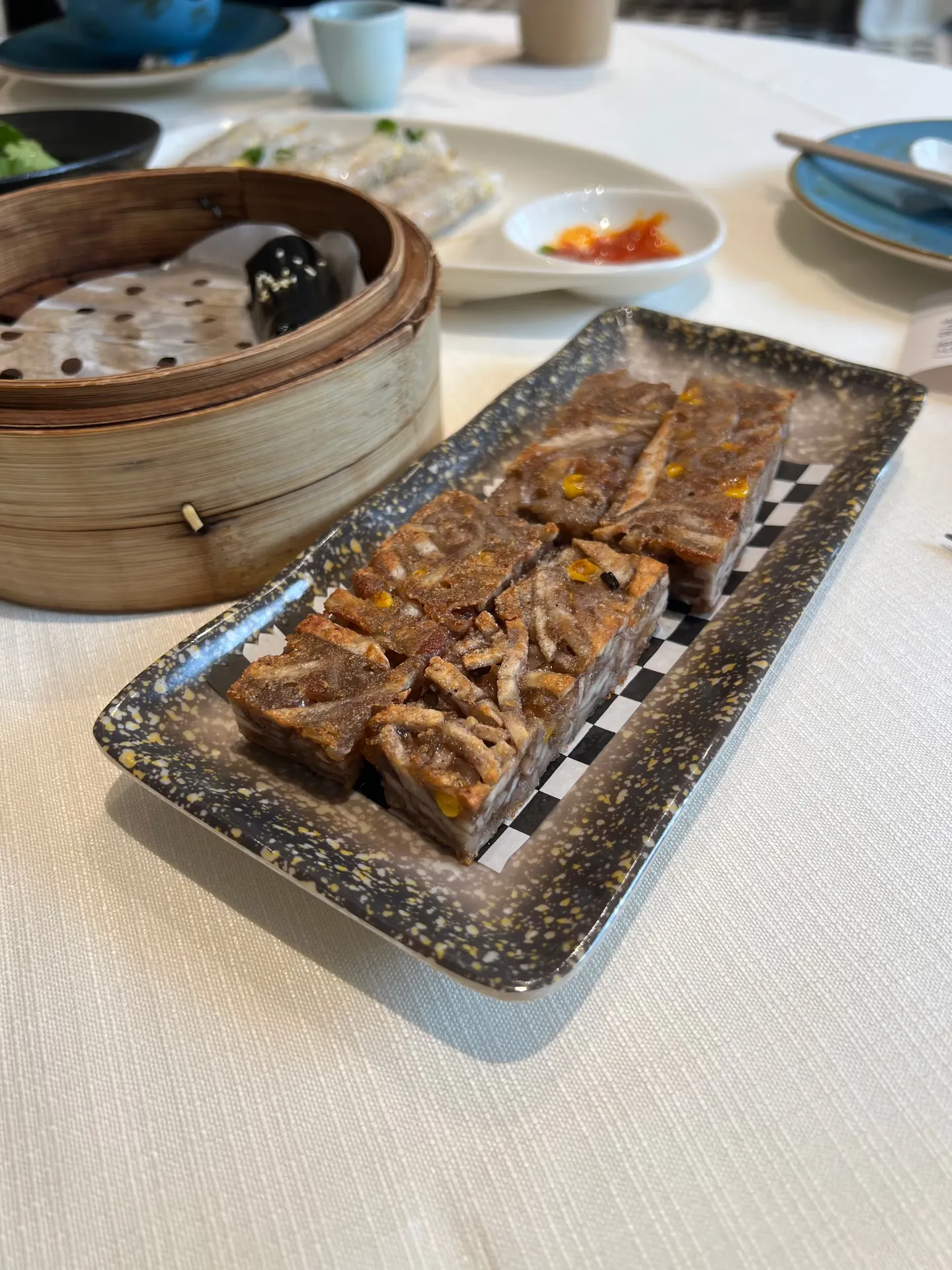 Grilled fish served on hot stones