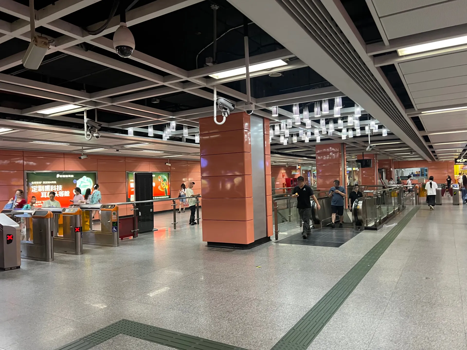 Ticket gates and the inside of a Guangzhou metro station