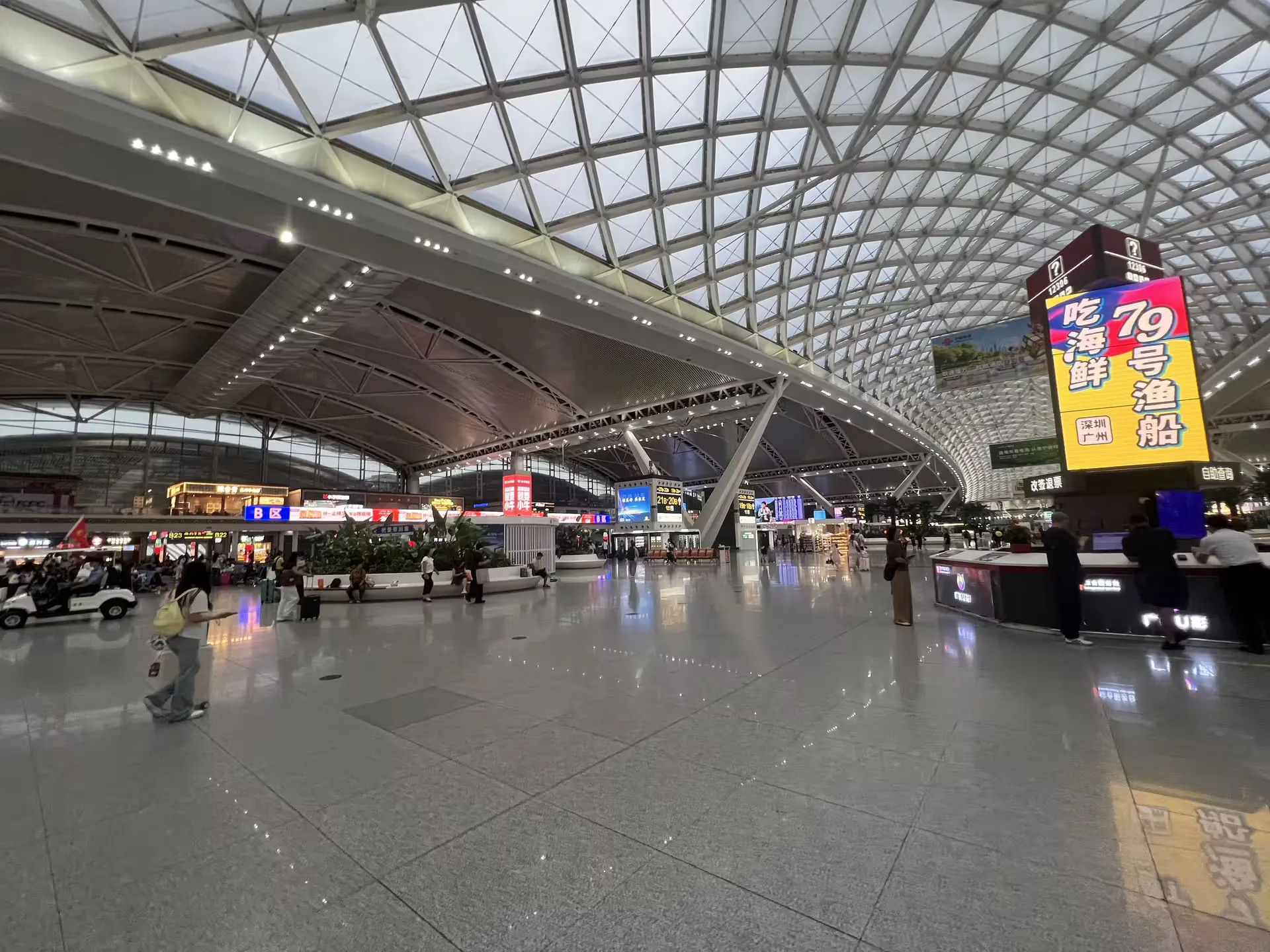 The vast waiting hall beneath the high ceiling at Guangzhou South station