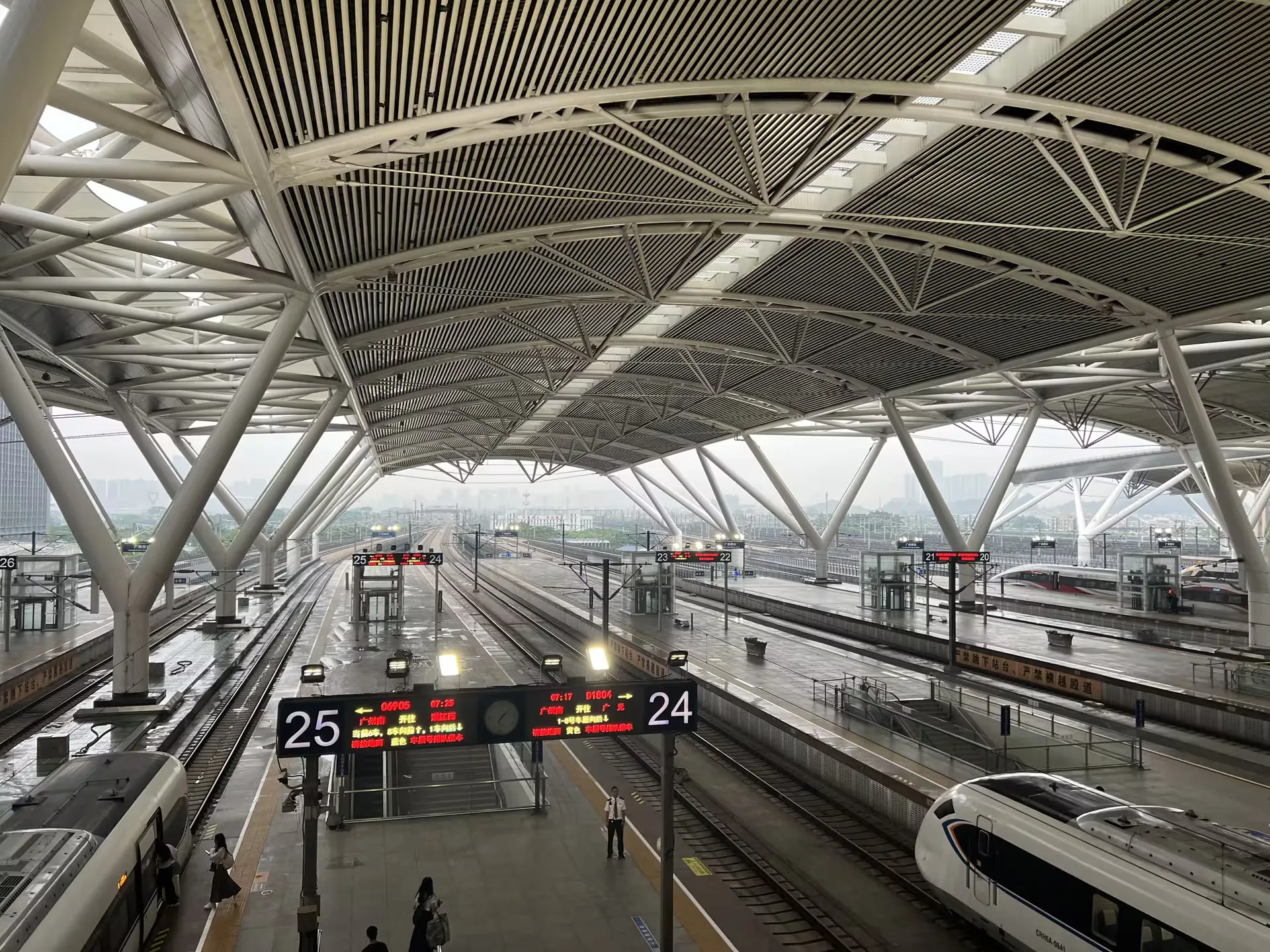 A fast train stopped at a platform at Guangzhou South station