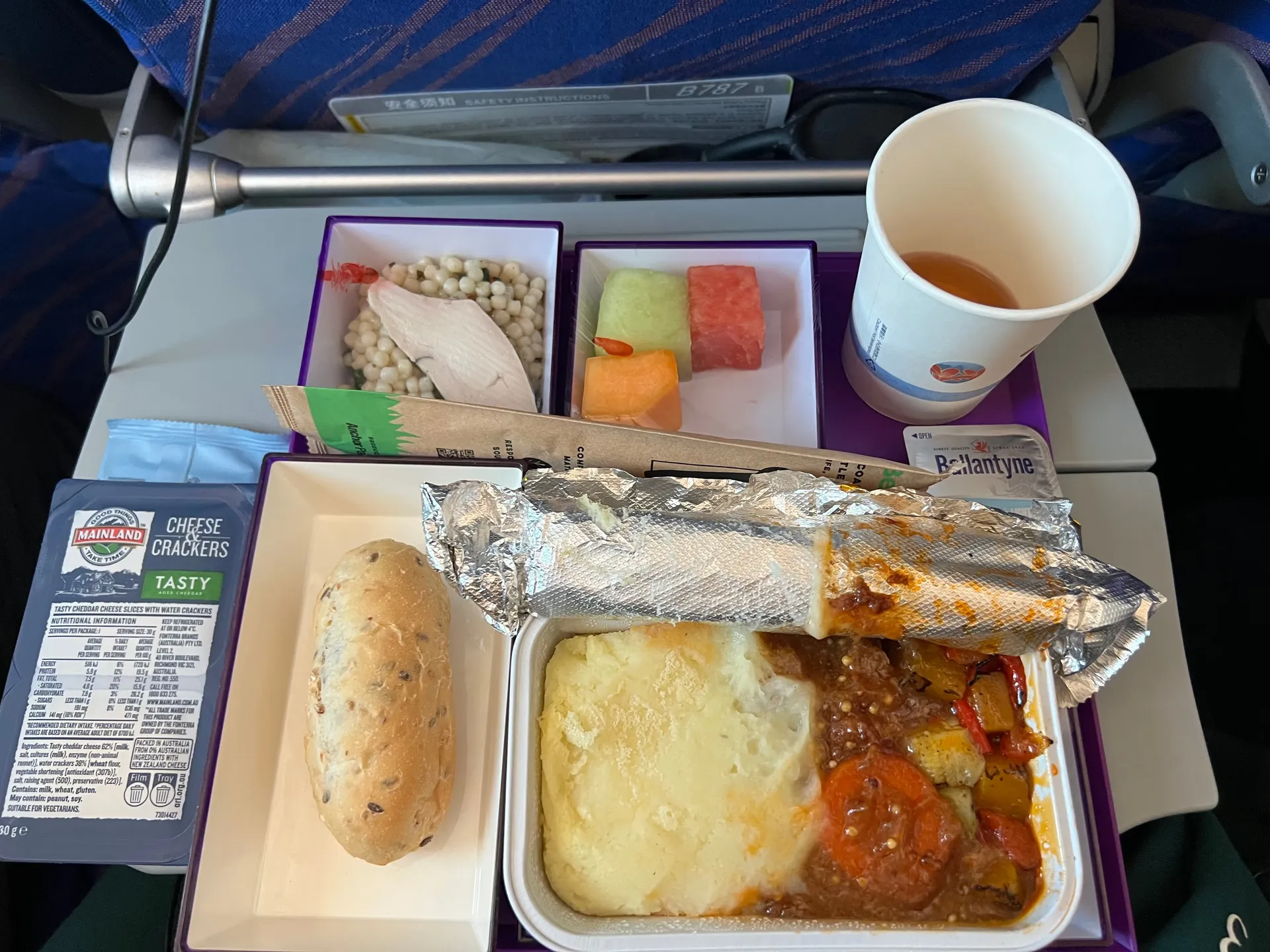 The first inflight meal with rice, bread and side dishes