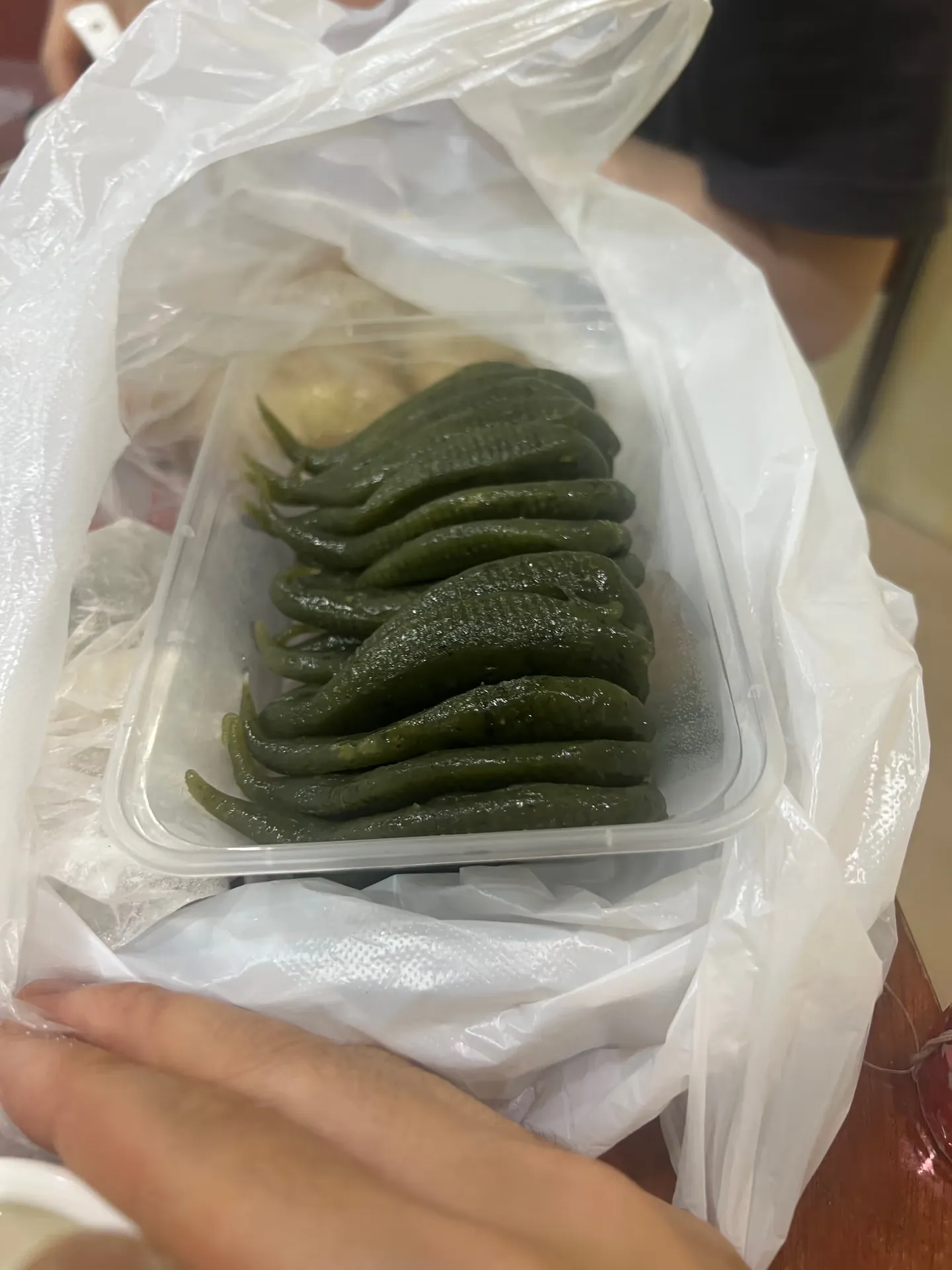 Dark green cakes stacked on top of one another