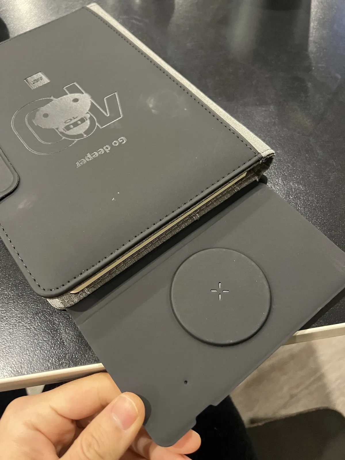 The diary's card slot and pen holder