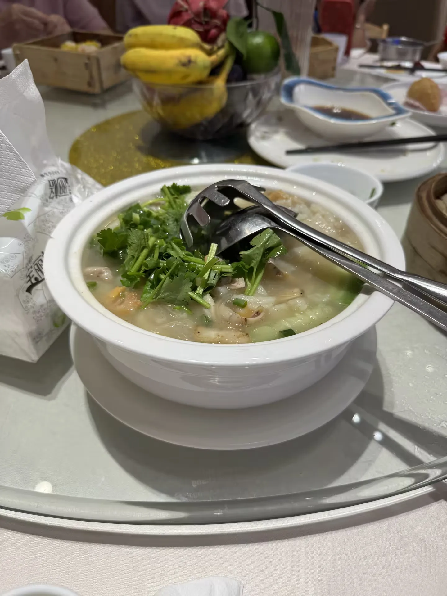 Warm soup with vegetables and seafood