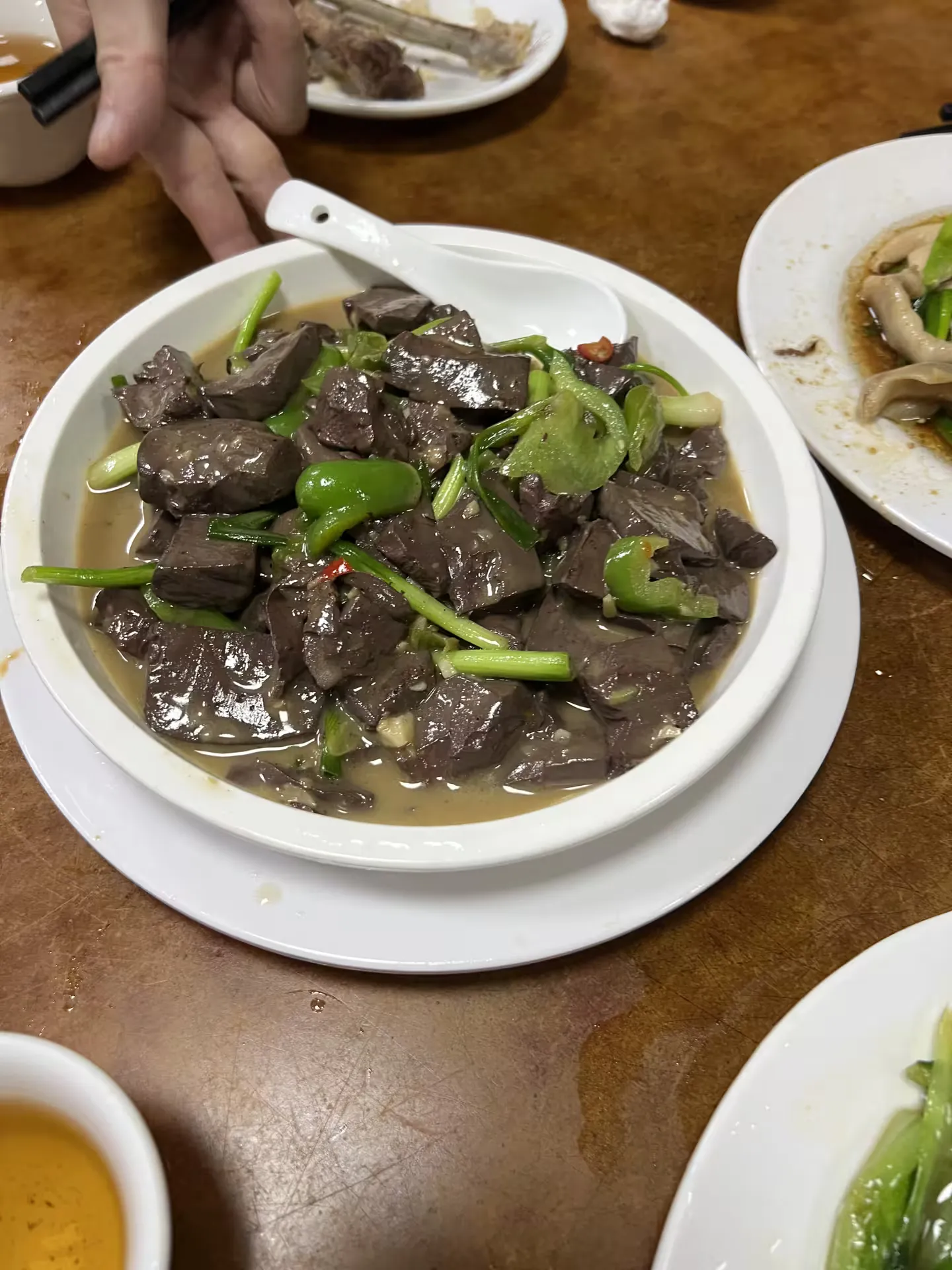Goose blood pudding stir fried with green chillies