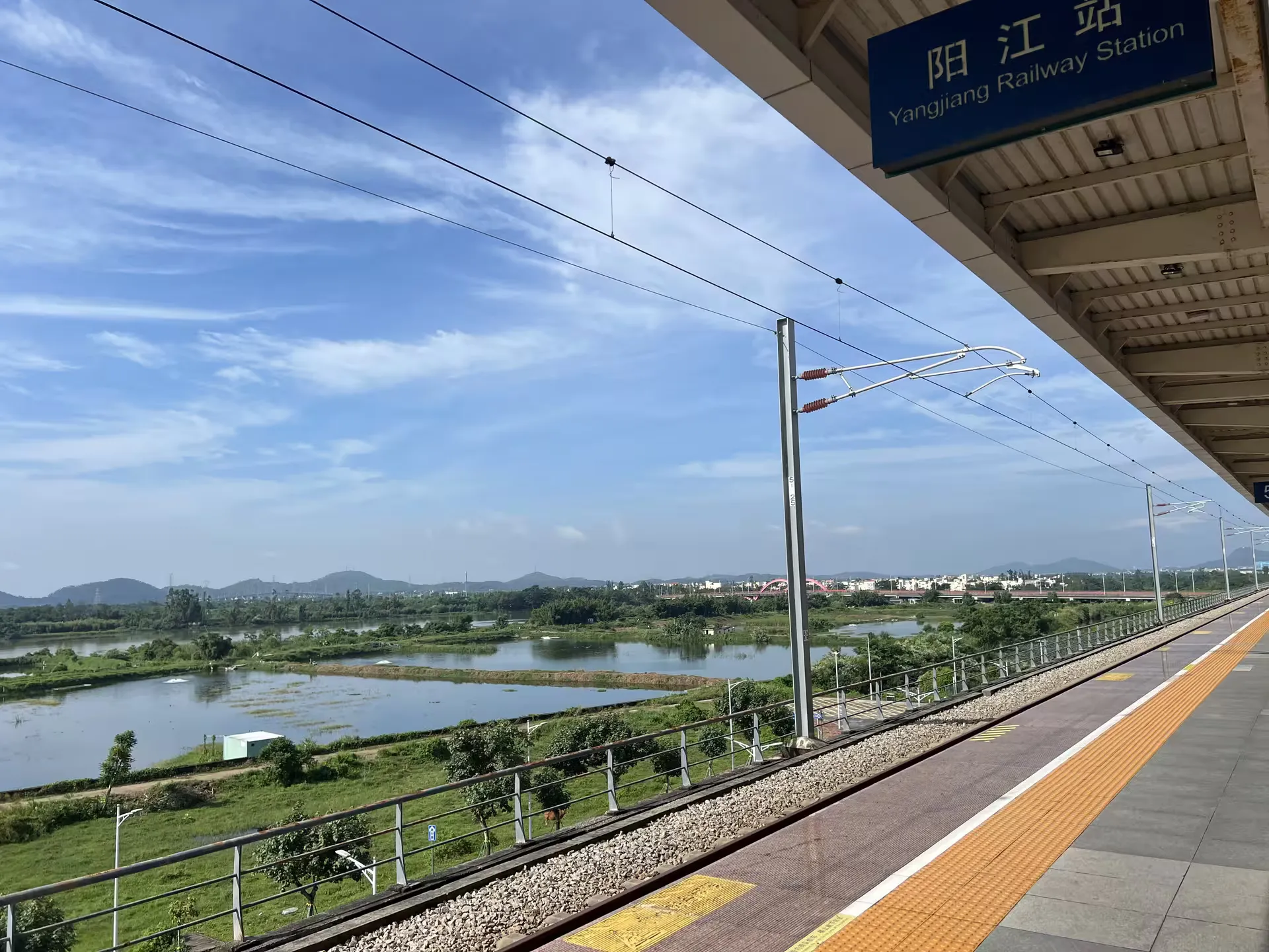 Yangjiang station and its surroundings under a clear sky